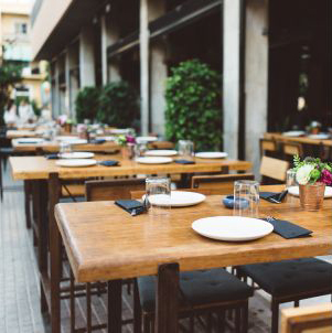 outdoor dining tables are served and ready for customers