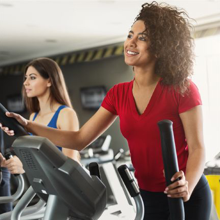 young women working out at a fitness center